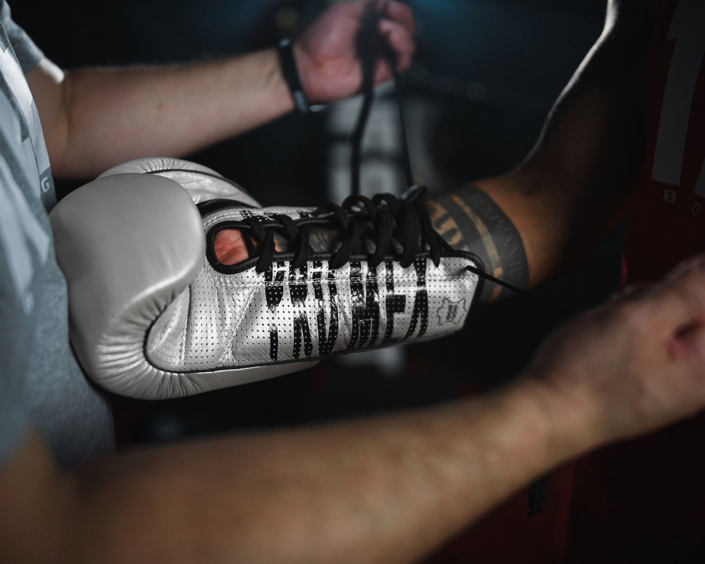 variant:silver::Pro Mex Professional Edge Lace Training/Sparring Boxing Gloves being laced up