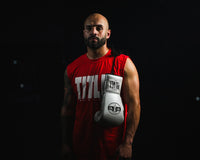 variant:silver::Pro Mex Professional Edge Lace Training/Sparring Boxing Gloves being carried