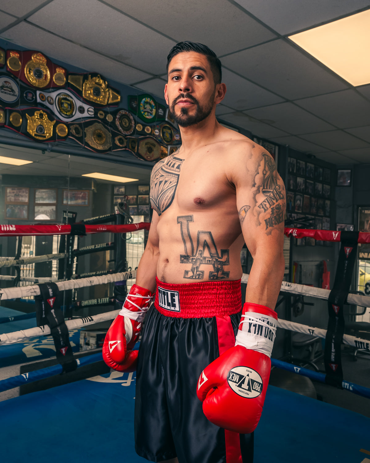 variant:Red/White::Pro Mex Combatiente Pro Fight Gloves boxer hands down in ring