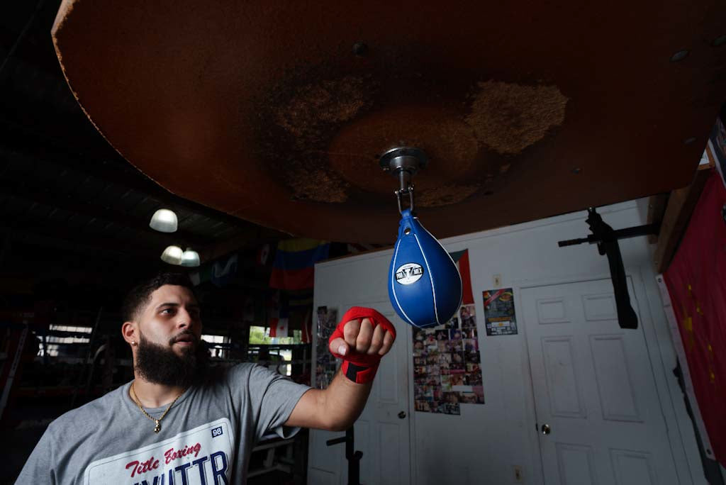 variant:4" x 7"::Pro Mex Professional Speed Bag V2.0 guy hitting bag front facing