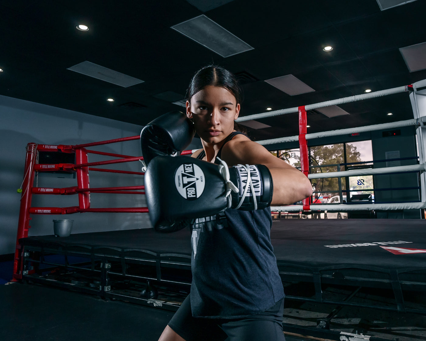 variant:Black/White::Pro Mex Professional Lace Sparring Gloves V3.0 girl boxing stance