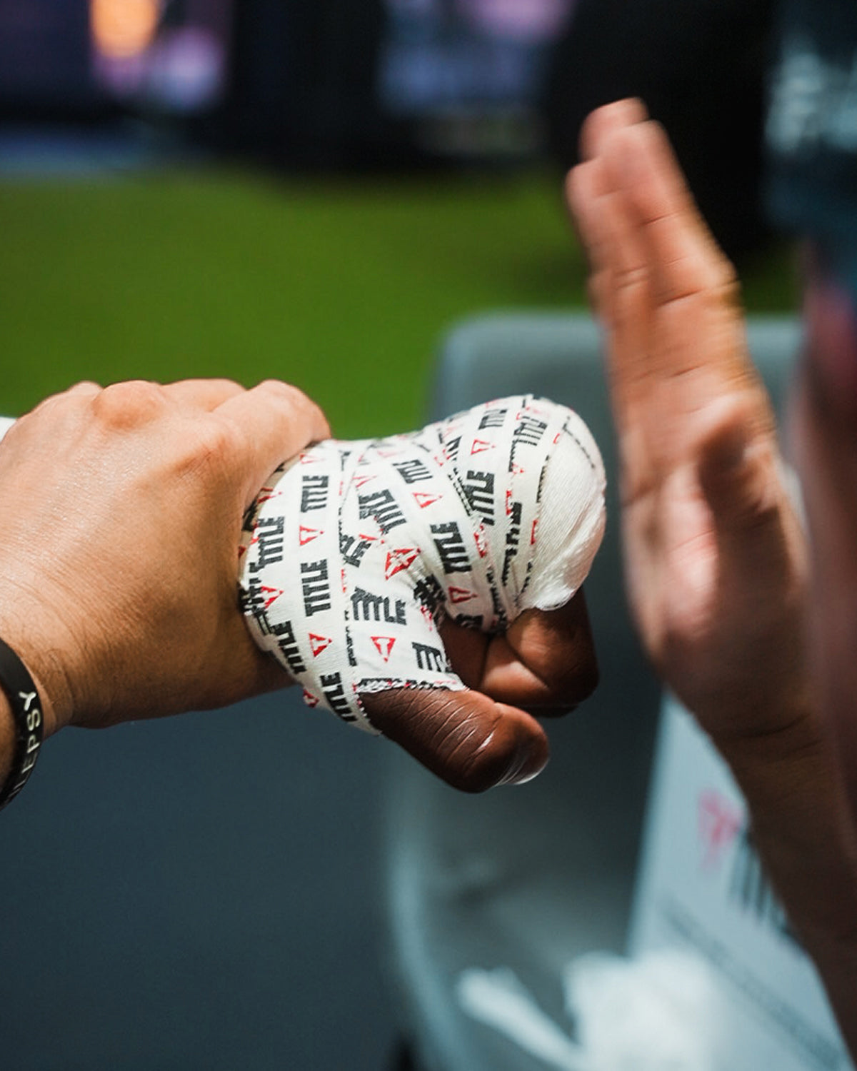 variant:lifestyle::TITLE Boxing Premier Tape closeup on fighter's hand