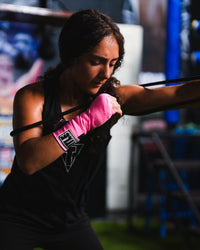 variant:lifestyle::TITLE Boxing Pro Shadow Boxer 2.0 closeup of being used in the gym for shadowboxing 