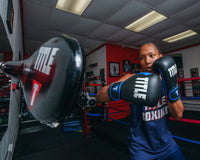 variant:lifestyle::TITLE Boxing Precision Spring-Flex Wall target boxer hands up