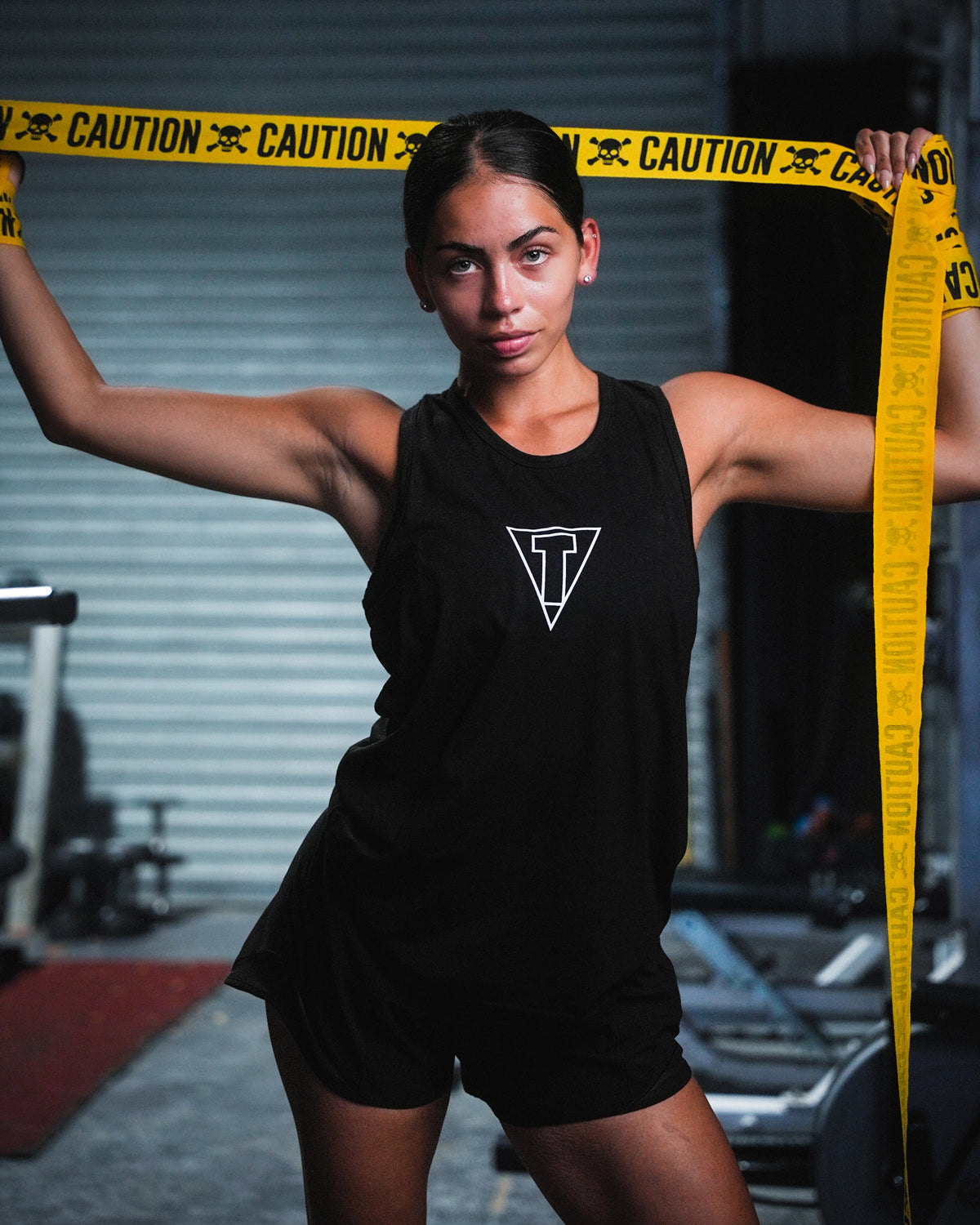 variant:caution::TITLE Boxing Print Mexican Style 180" Hand Wraps unrolled held up by fighter