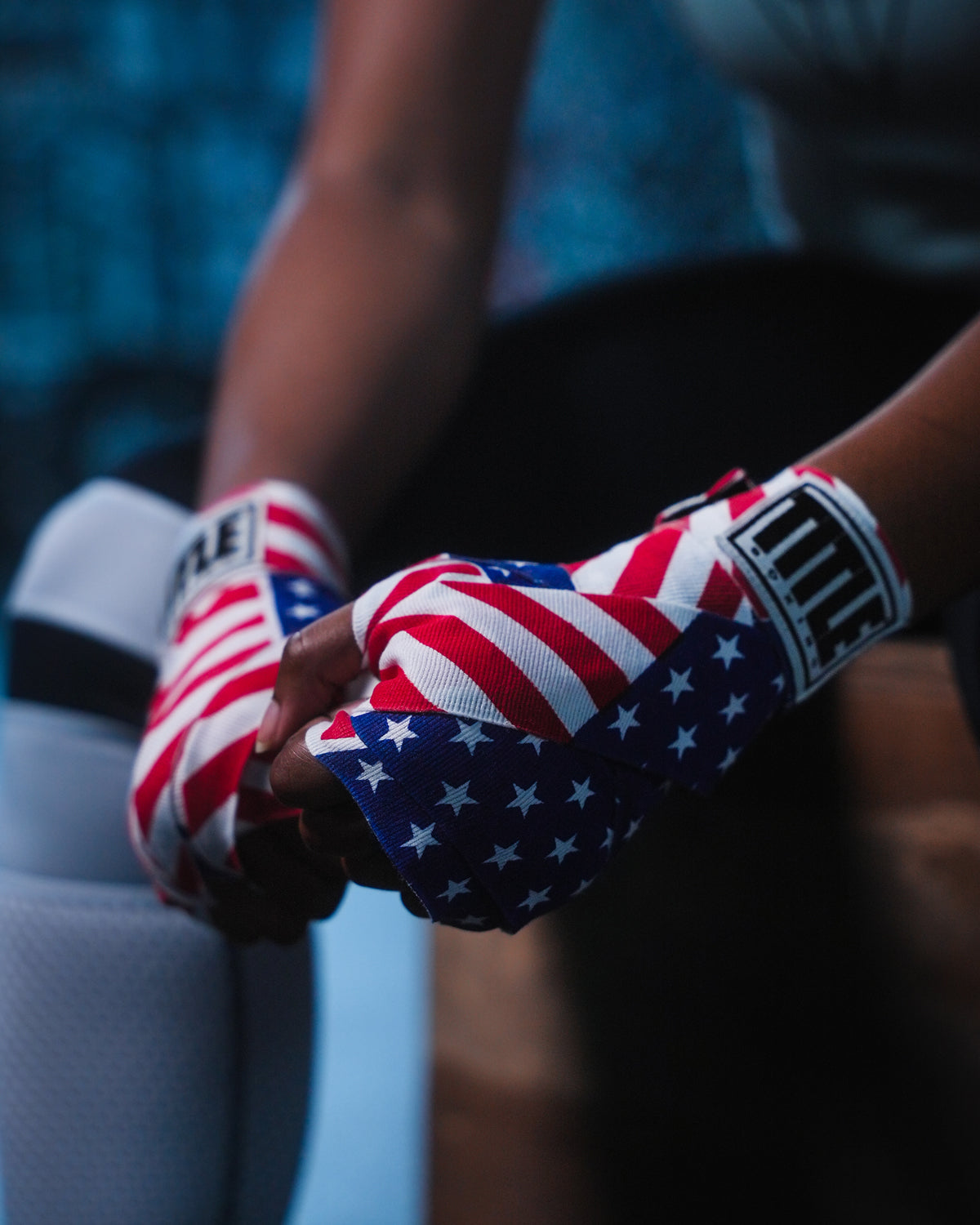 variant:USA flag::TITLE Boxing Print Mexican Style 180" Hand Wraps closeup on boxer's hands