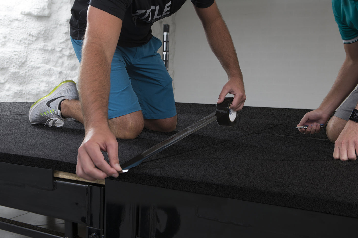 variant:lifestyle::TITLE Boxing Polyethylene Training Ring Padding (Single) being put together