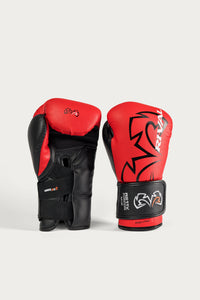 variant:red::A pair of MMA sparring gloves in red and black, featuring the brand name 'RZ' and a stylized wolf head logo, displayed against a light gray background.