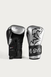 variant:Silver::A pair of boxing gloves in black and metallic silver with white graphic designs and branding, displayed against a light gray background.