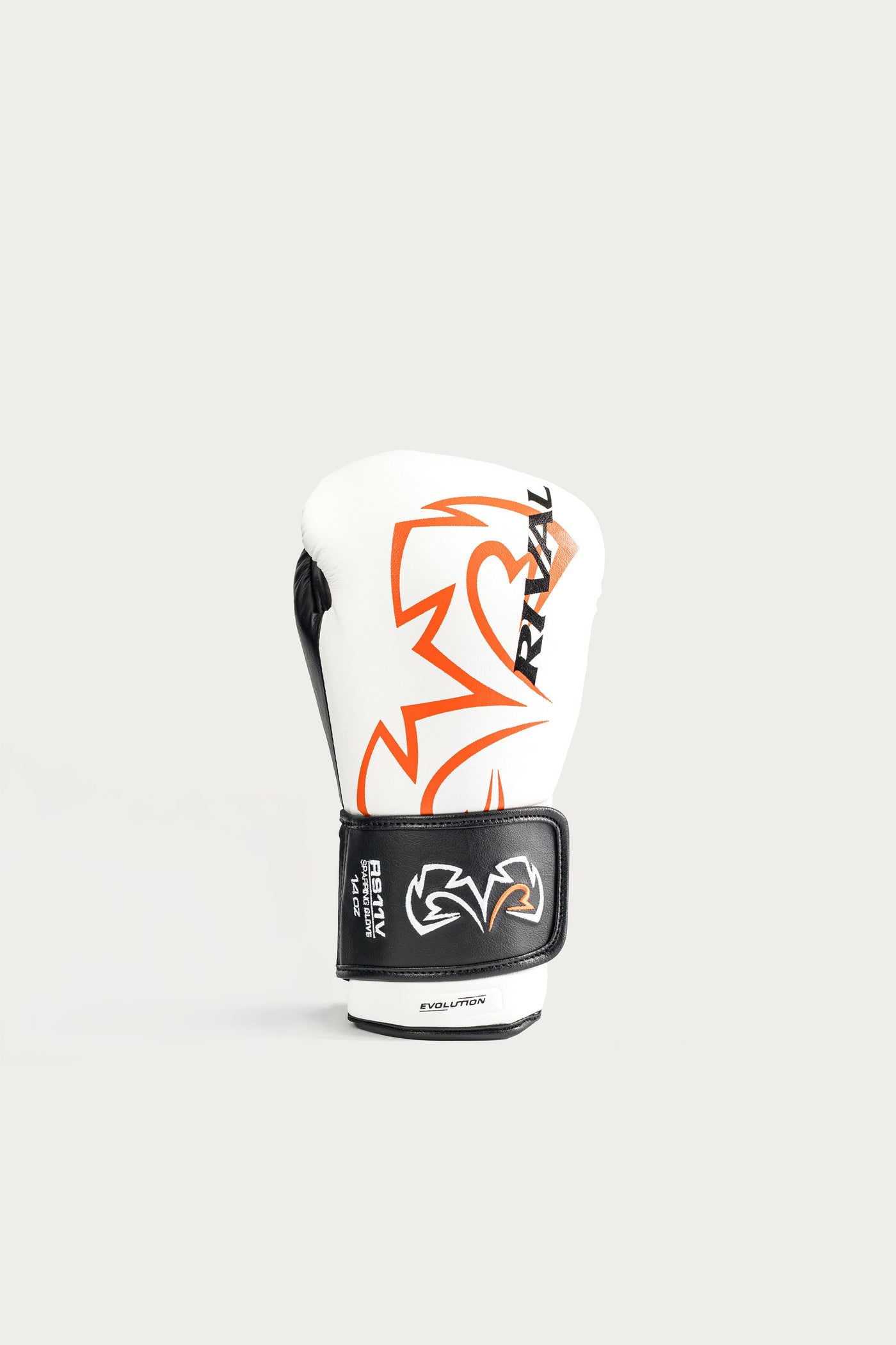variant:white::A single white boxing glove with black and orange graphics, featuring the RIVAL brand name and logo, set against a solid light gray background.
