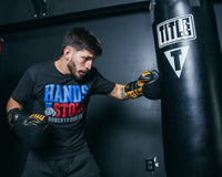 variant:lifestyle::TITLE Boxing Roberto Duran Leather Sparring Gloves  bag jab left