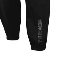variant:lifestyle::TITLE Boxing Reign Rubberized Sauna Suit leg view closeup