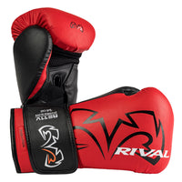 color:red::A pair of red and black boxing gloves with the brand name 'RIVAL' printed in white on the glove, shown against a solid white background.