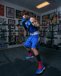 variant:red/blue::TITLE Boxing Stinger Reversible Amateur Boxing Set boxing stance blue out boxing stance