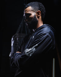 variant:black/white::TITLE Boxing Thermal Insulated Roadwork Hoodie on athlete in the gym