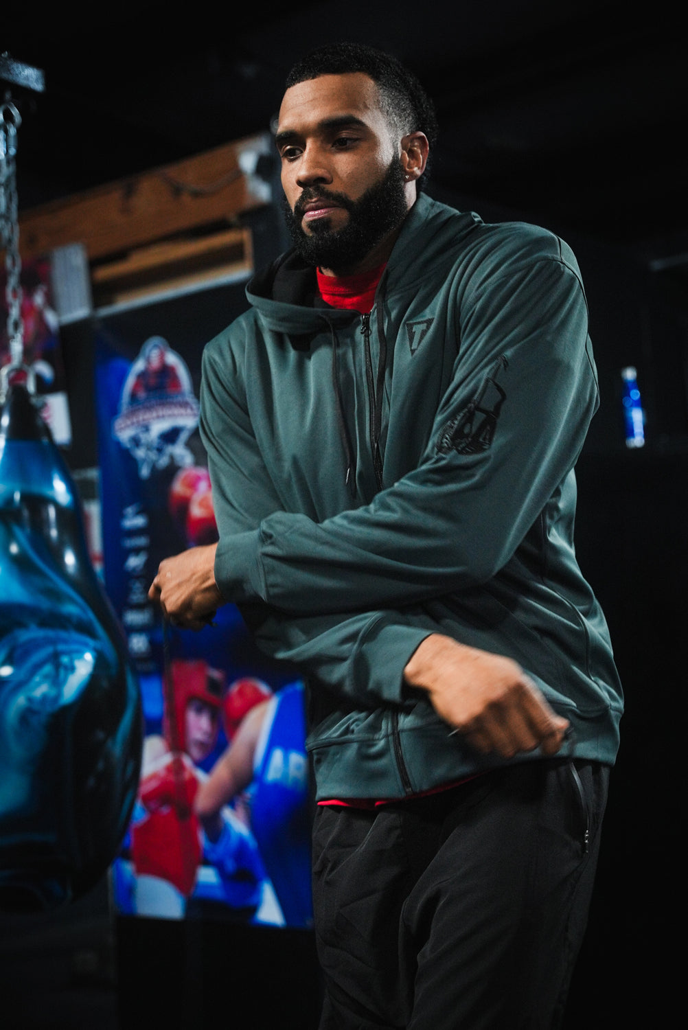 variant:grey/black::TITLE Boxing Thermal Insulated Roadwork Hoodie on athlete in the gym