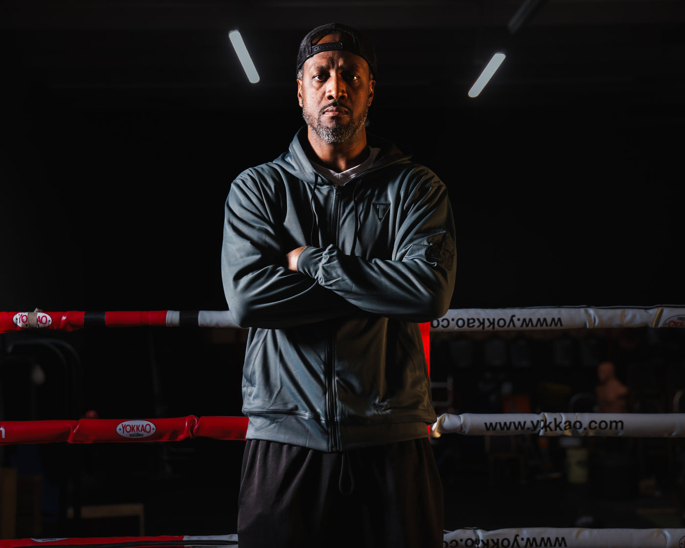 variant:grey/black::TITLE Boxing Thermal Insulated Roadwork Hoodie on athlete in the ring