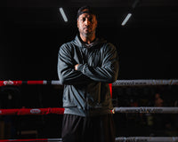 variant:grey/black::TITLE Boxing Thermal Insulated Roadwork Hoodie on athlete in the ring