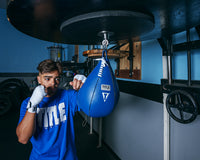 variant:10" x 12"::TITLE Boxing Super Speed Bags guy hitting speed bag
