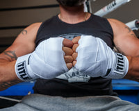 variant:white::TITLE Boxing Select 180" Semi Elastic Mexican Hand Wraps guys wraps together