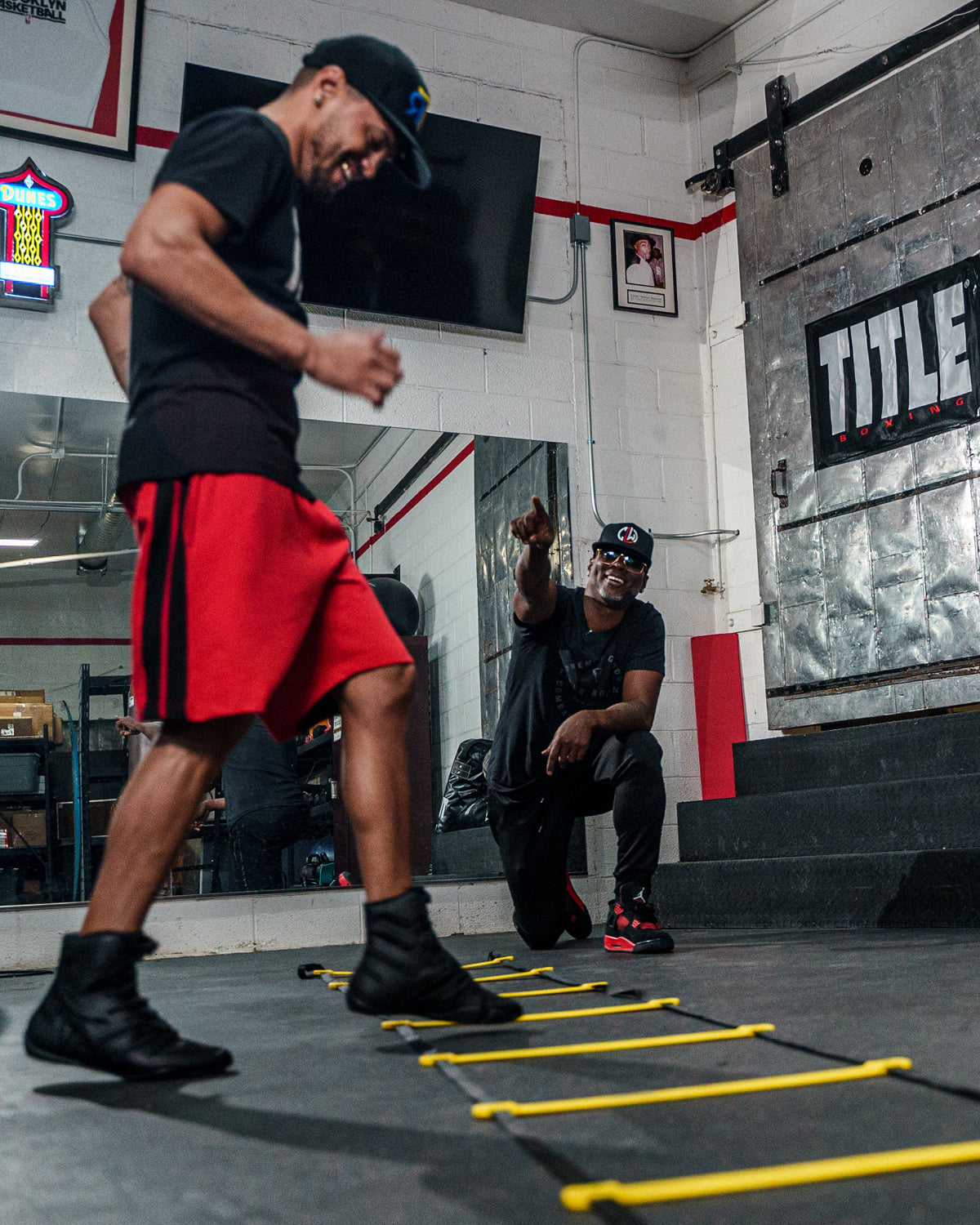 variant:lifestyle::TITLE Boxing Speed & Agility Ladder close up view of the ladder in use
