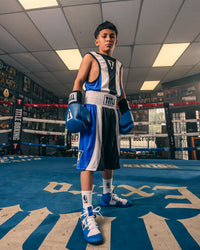 variant:Blue/White::TITLE Boxing Momentum Amateur Boxing Set kid in center of ring posing