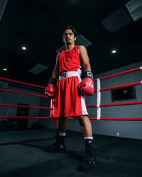 variant:red/white::TITLE Boxing Aerovent Elite Amateur Boxing Set Original 2.0 guy looking down camera taking up picture at him