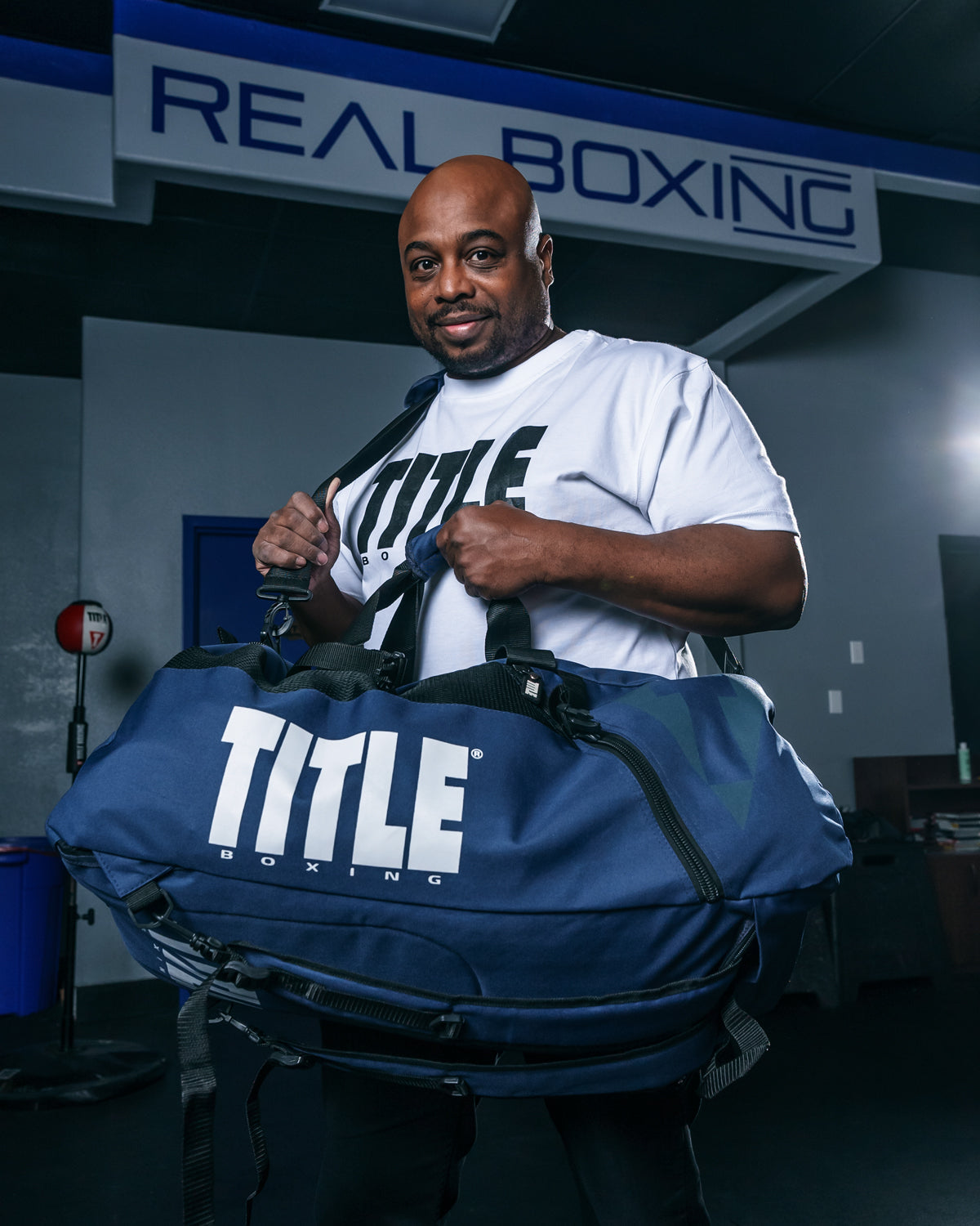 variant:blue/black::TITLE Boxing Champion Sport Bag guy showing front of bag