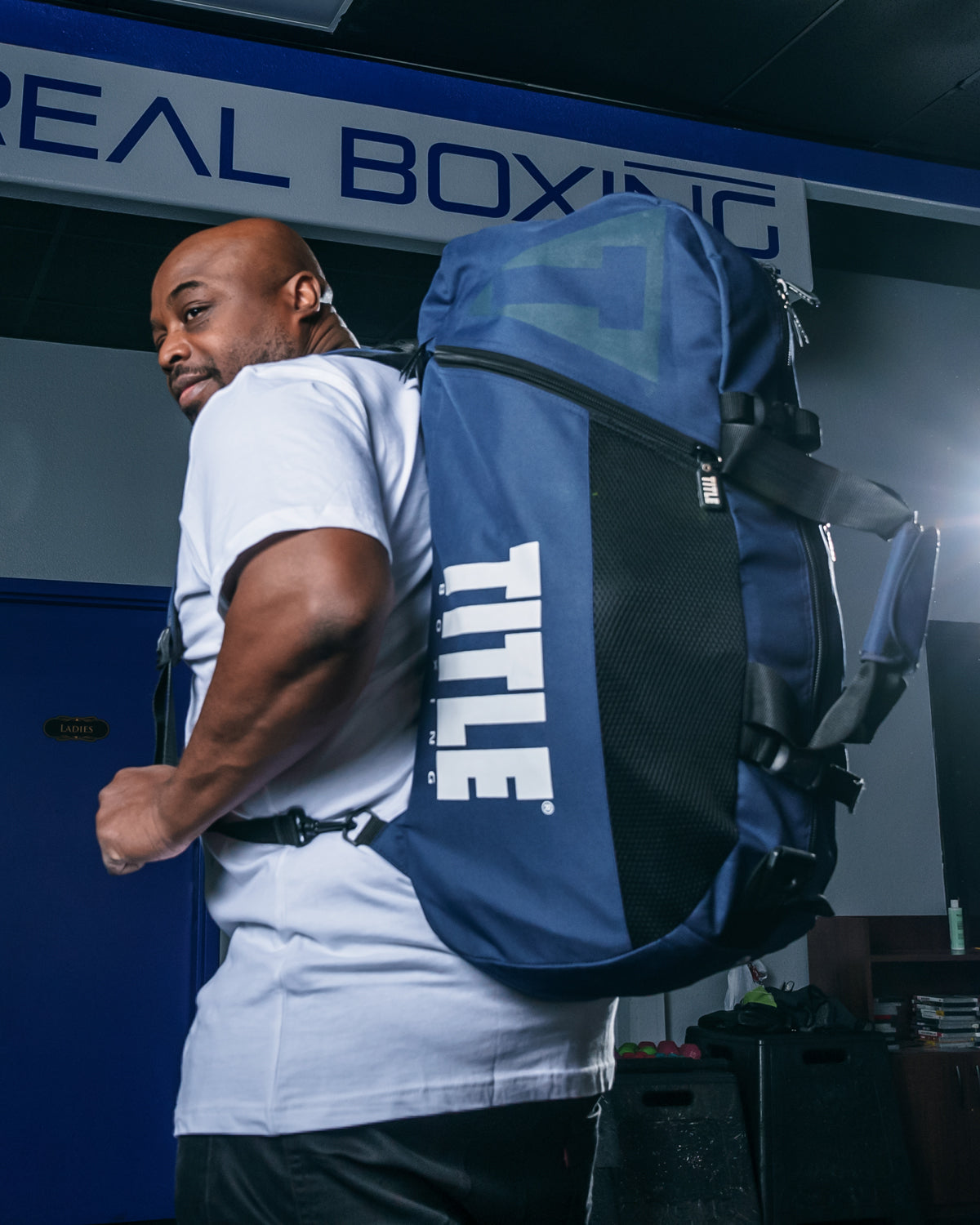 variant:blue/black::TITLE Boxing Champion Sport Bag guy carring bag bookbag version