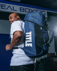 variant:blue/black::TITLE Boxing Champion Sport Bag guy carring bag bookbag version