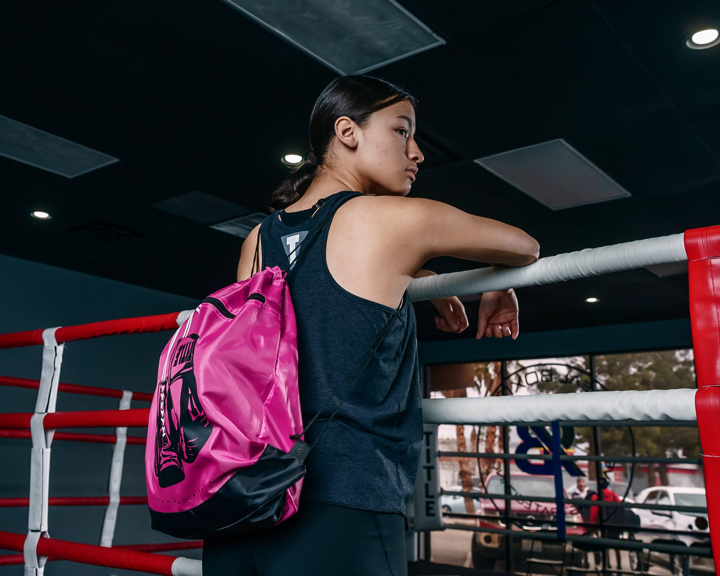 variant:pink::TITLE Boxing Bruiser Gym Sack girl wearing bag