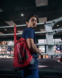 variant:red::TITLE Boxing Bruiser Gym Sack guy wearing bag