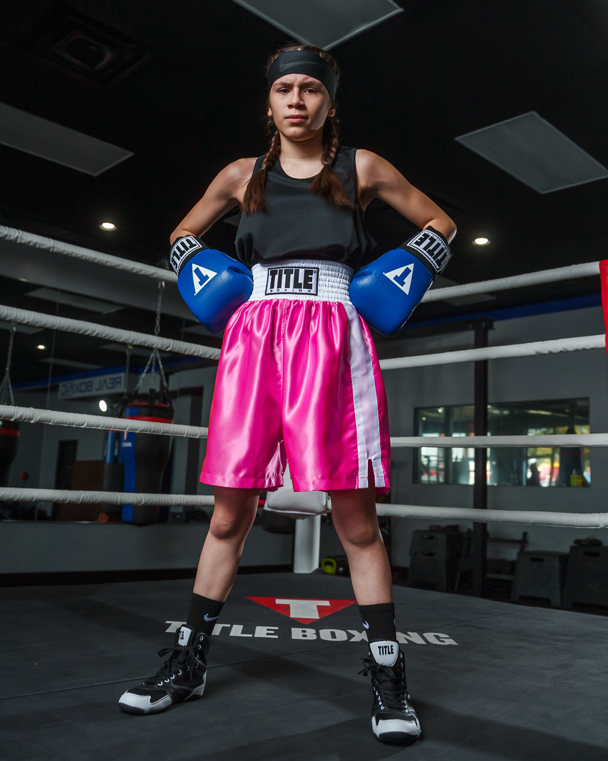 variant:black::TITLE Boxing Aerovent Elite Racerback Boxing Jersey 2.0  girl in ring