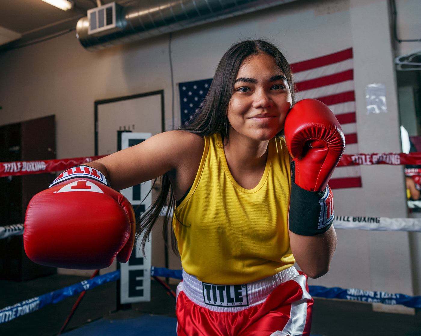 variant:gold::TITLE Boxing Aerovent Elite Racerback Boxing Jersey 2.0 girl right jab