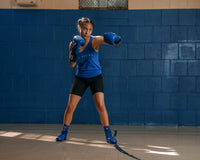 variant:Blue::TITLE Boxing Speed-Flex Encore Mid-Top Shoes girl boxing pose