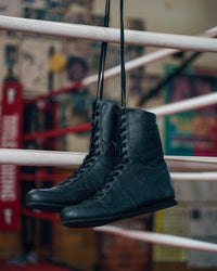 variant:black::TITLE Boxing High-Top Leather Boxing Shoes hanging shoes