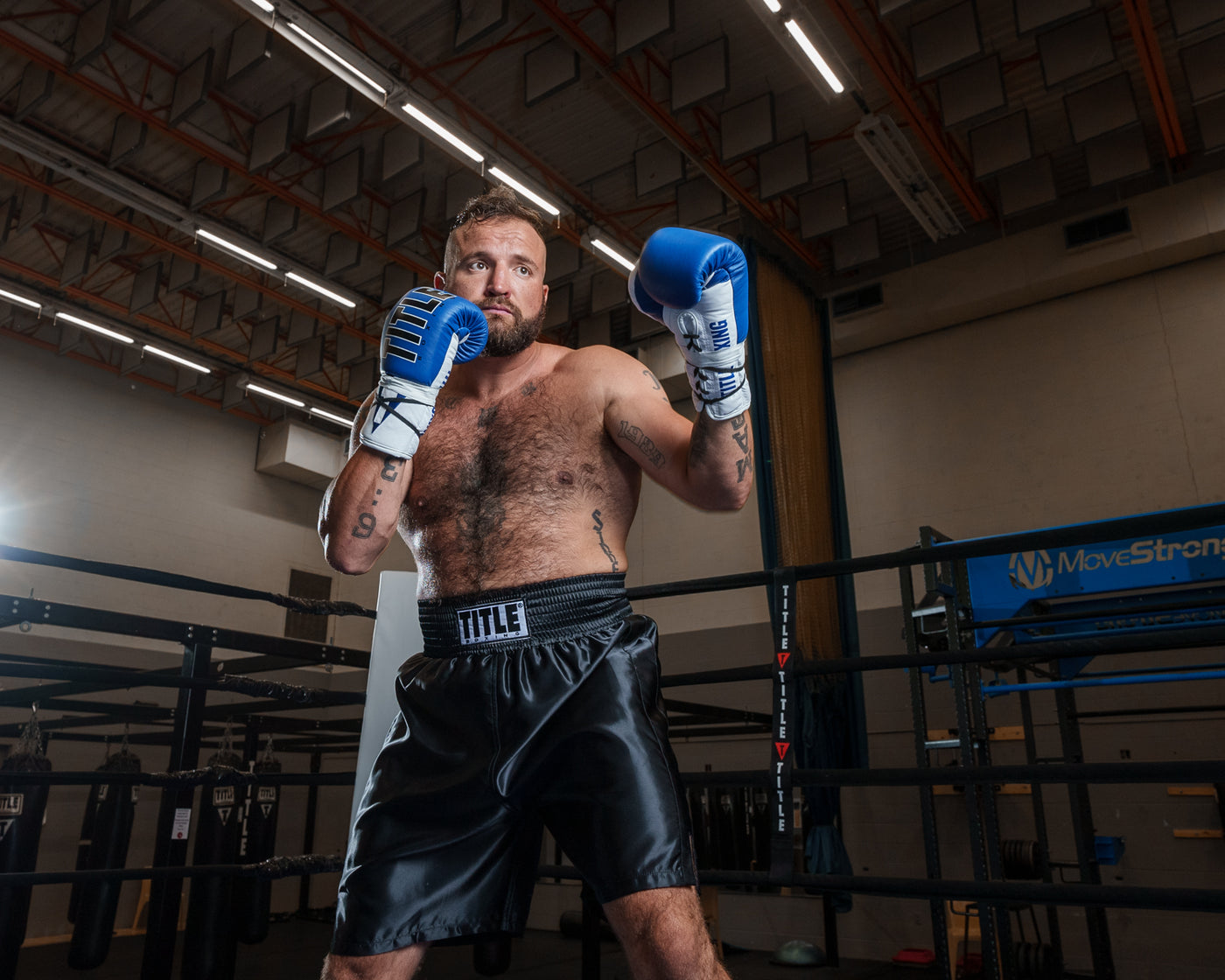 variant:black::TITLE Boxing Edge Boxing Trunks 2.0 guy shadow boxing