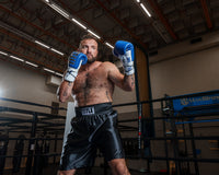 variant:black::TITLE Boxing Edge Boxing Trunks 2.0 guy shadow boxing