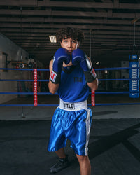 variant:blue/white::TITLE Boxing Edge Boxing Trunks 2.0 boxing pose hands up