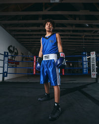 variant:blue/white::TITLE Boxing Edge Boxing Trunks 2.0 boxing stance hands down