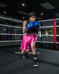 variant:pink/white::TITLE Boxing Edge Boxing Trunks 2.0 girl boxing stance