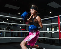 variant:pink/white::TITLE Boxing Edge Boxing Trunks 2.0 girl boxing pose