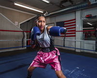 variant:pink/black::TITLE Boxing Edge Boxing Trunks 2.0  girl in ring left  hook