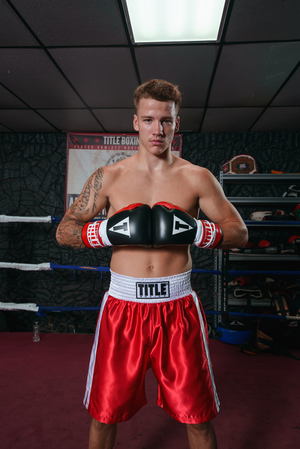 variant:red/white::TITLE Boxing Edge Boxing Trunks 2.0 guy touching gloves