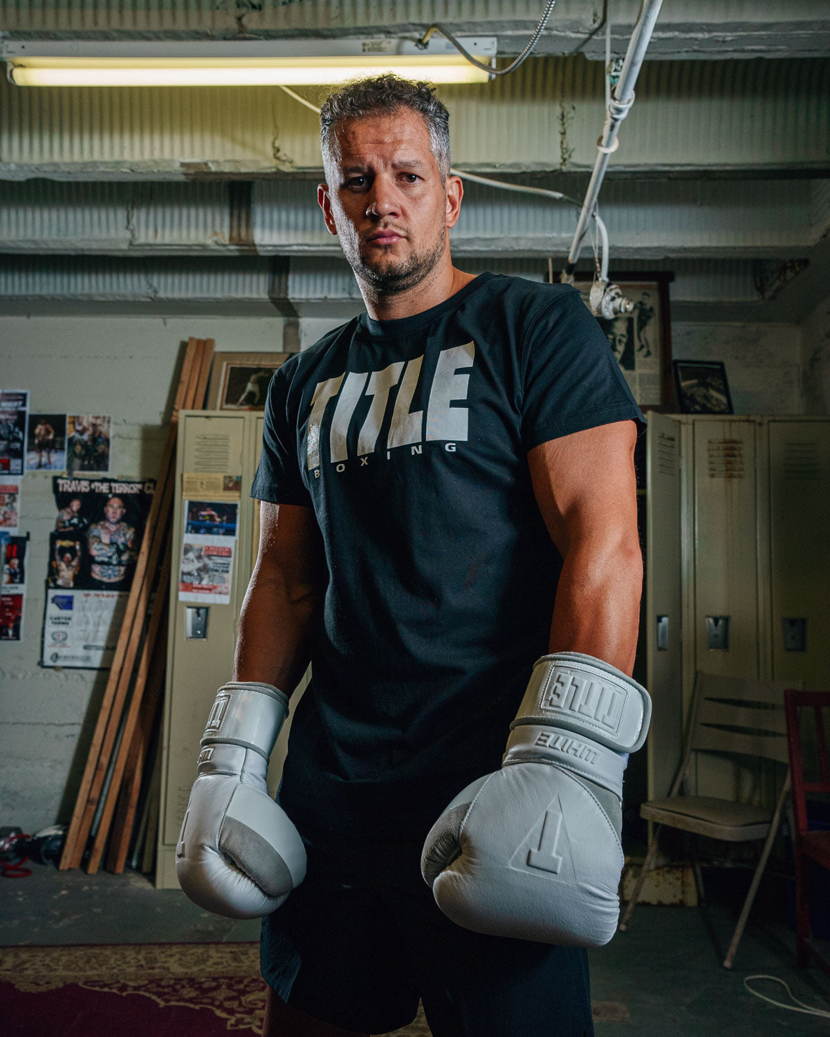 variant:Black/White::TITLE Boxing Iconic Block Tee man posing in tee