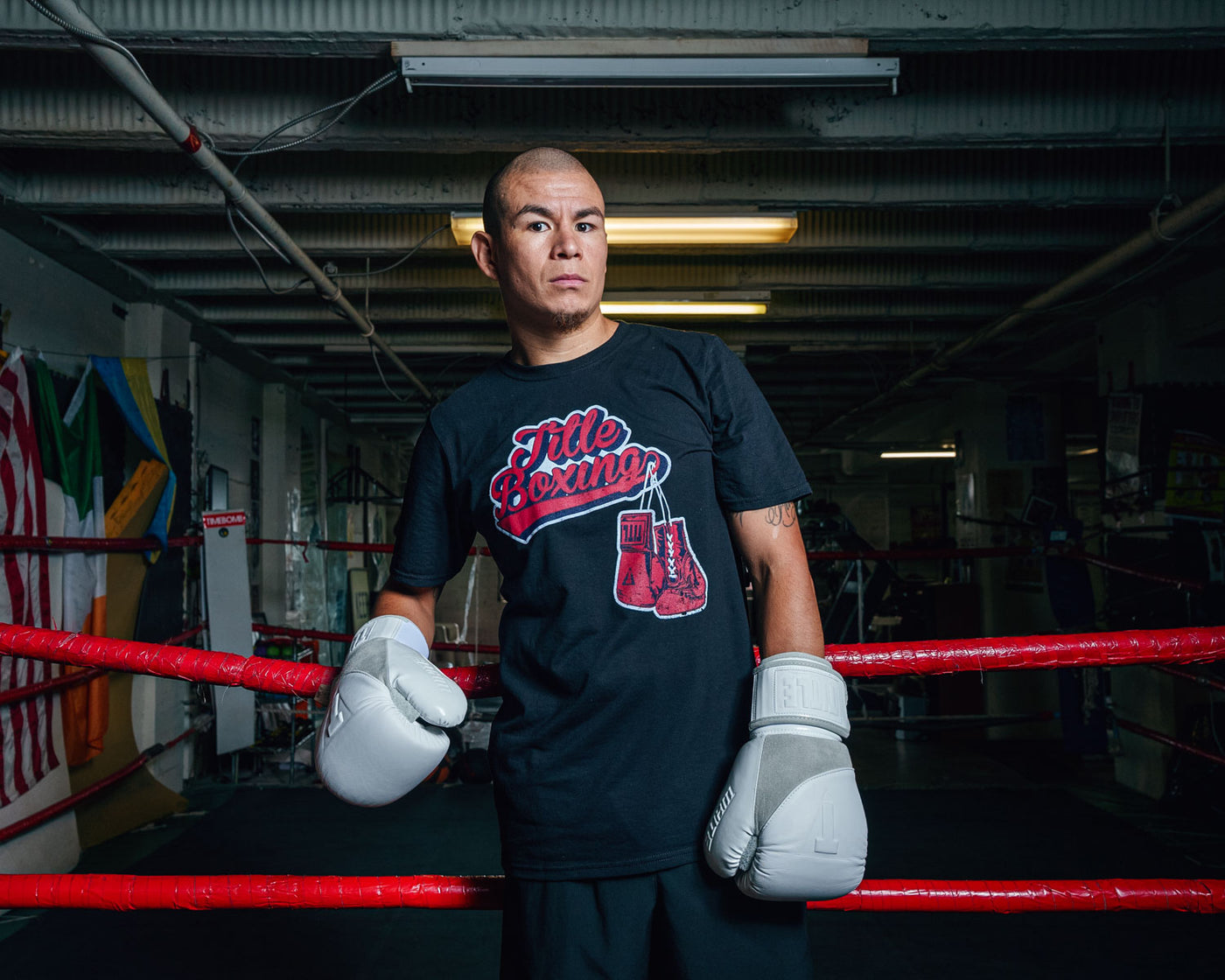 variant:black::TITLE Boxing Classic Script Performance Tee man on ring