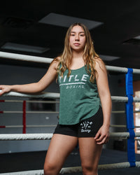 variant:green::TITLE Boxing Women's Striped Wordmark Cropped Tank girl in ring