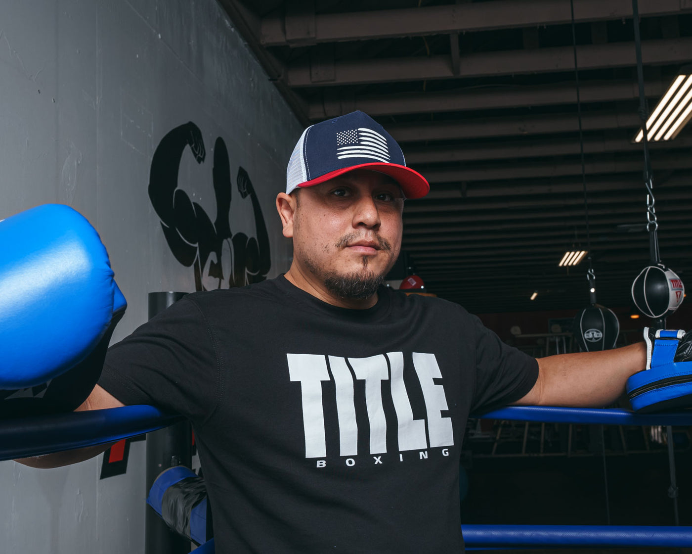 variant:red/white/blue::TITLE Boxing Pride Adjustable Mesh Cap coach in corner of ring with mitts