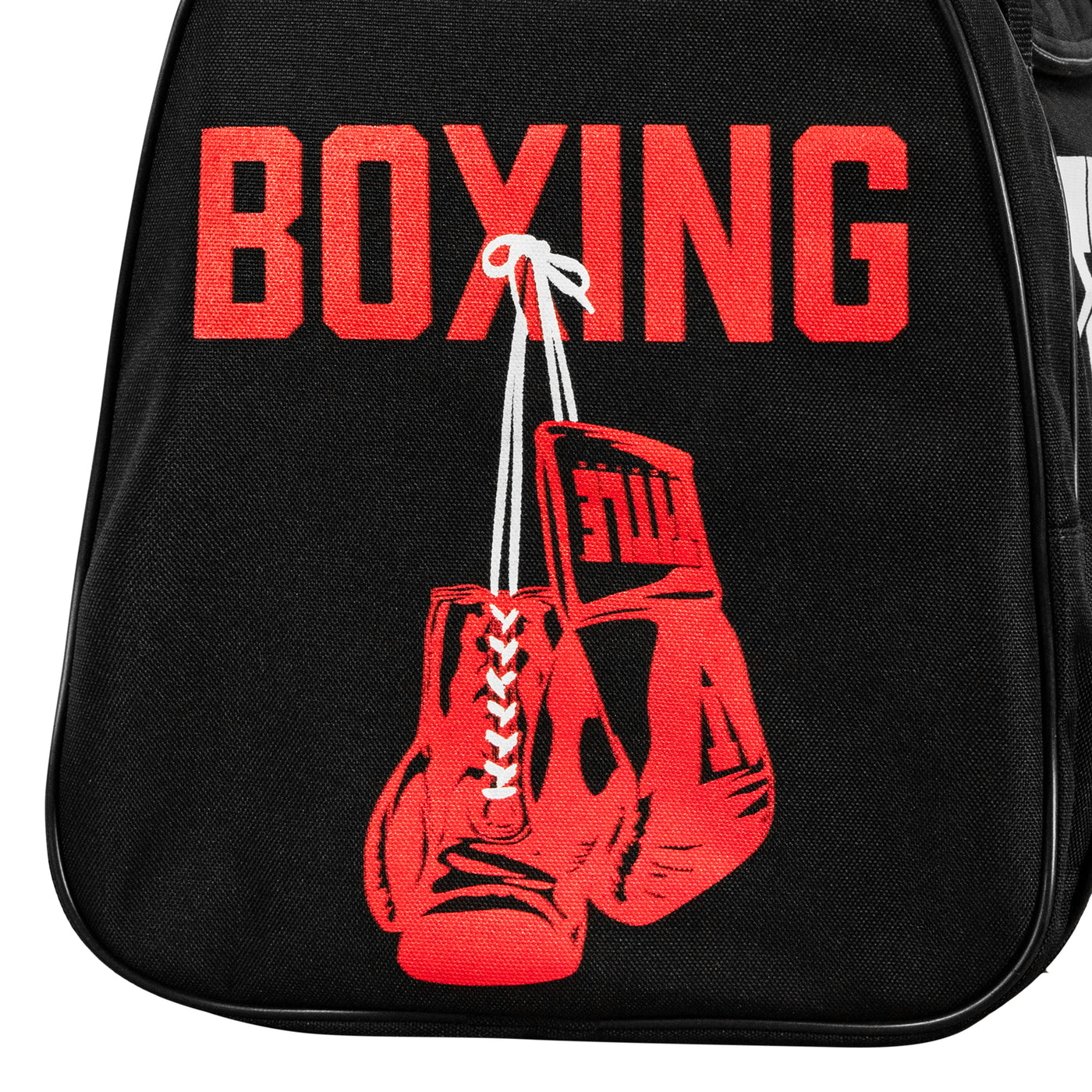 variant:lifestyle::close view of side pocket on sports equipment bag with boxing gloves on it