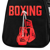 variant:lifestyle::close view of side pocket on sports equipment bag with boxing gloves on it
